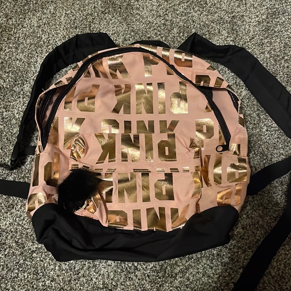 Pink and black backpack